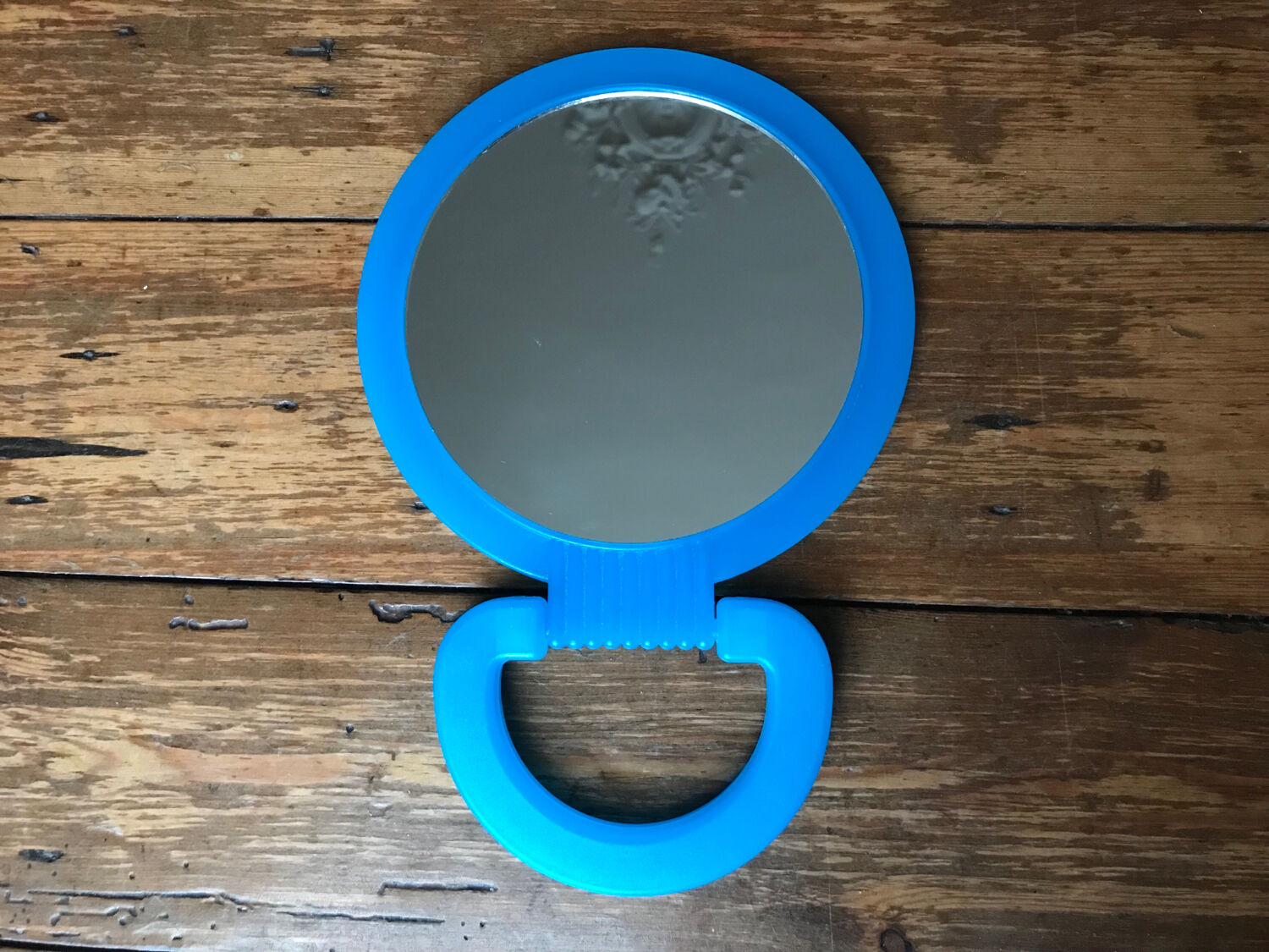 Mirror to pose vintage turquoise blue