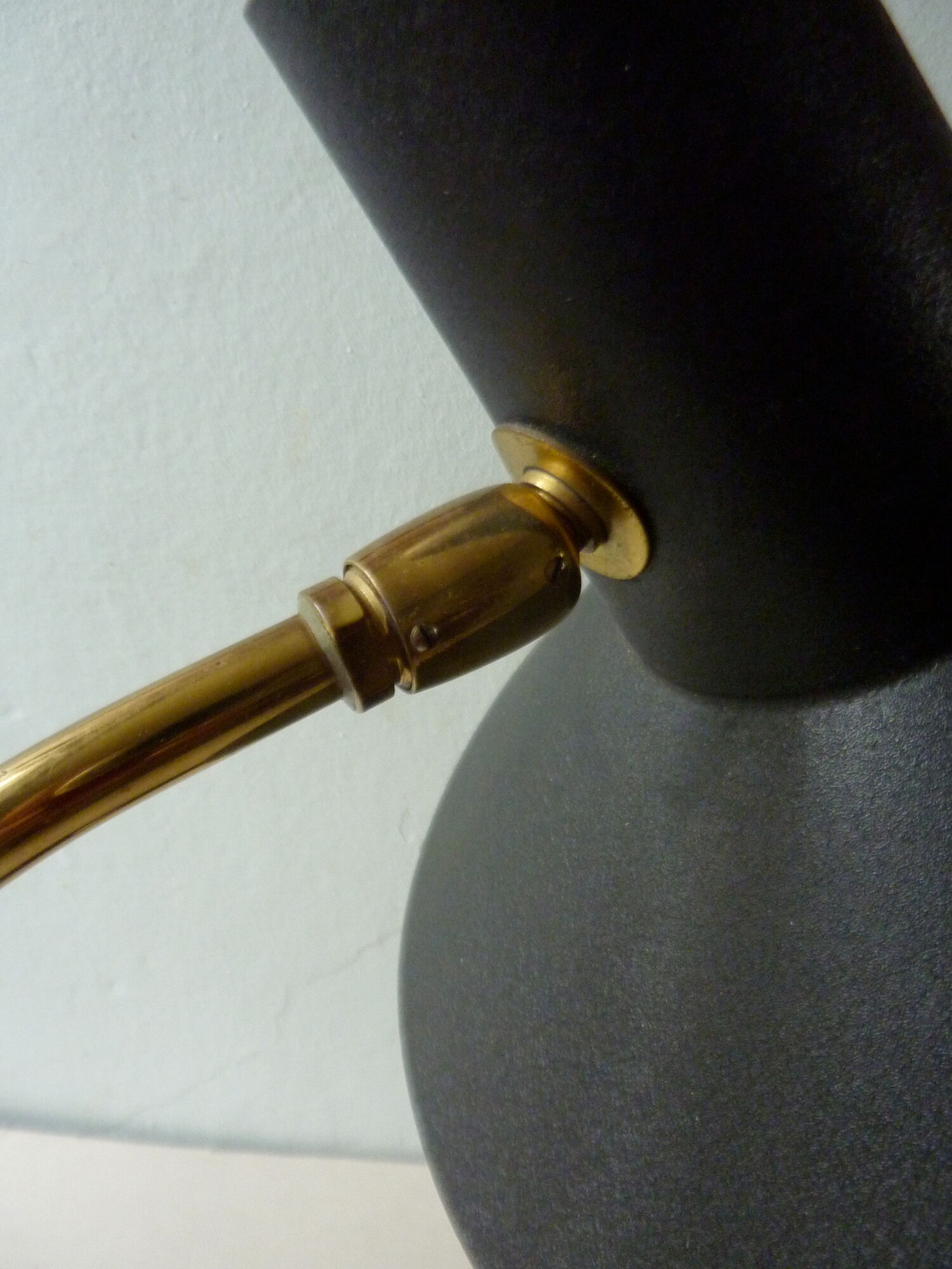 Lamp with ball black metal and brass of the 1950s
