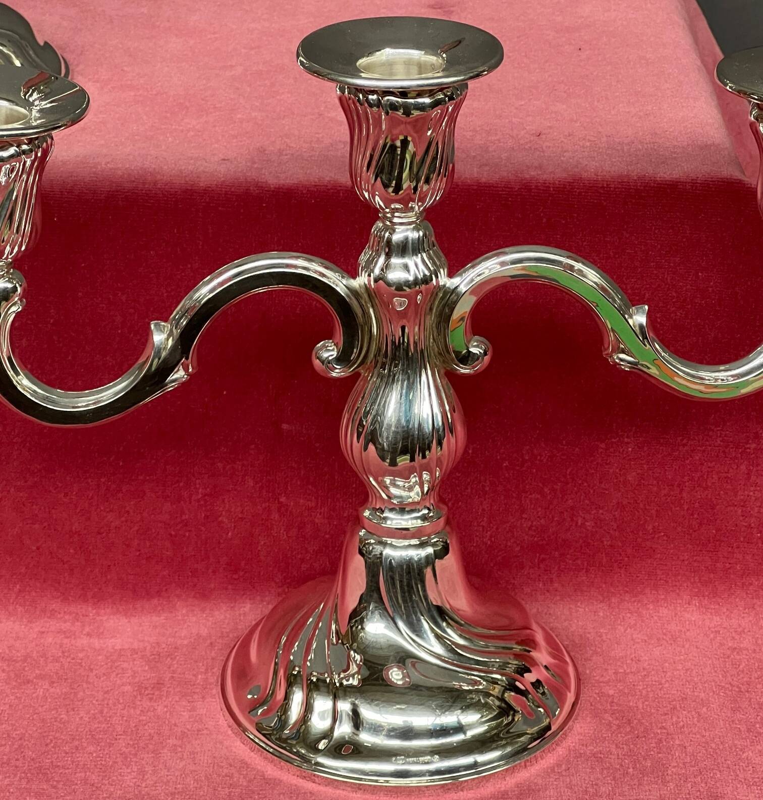 Pair of candlesticks. Silver-plated metal.
