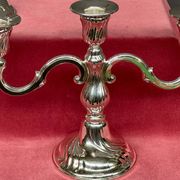 Pair of candlesticks. Silver-plated metal.