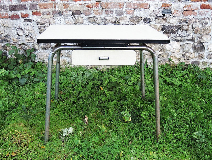 Old extendable table in yellow formica