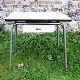 Old extendable table in yellow formica