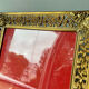 Vintage metal frame in gold colored brass 29.5 cm x 23 cm convex glass