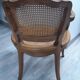 Fauteuil cabriolet canné de style Louis XV