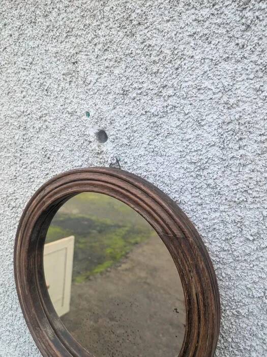 Small round mirror