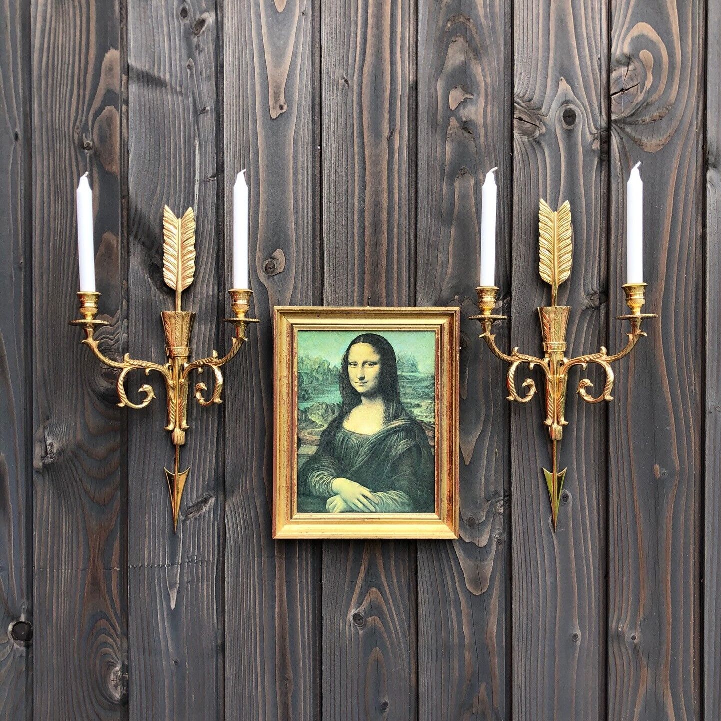 Pair of wall lamps decorated with bronze arrows "Cupid"