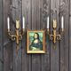 Pair of wall lamps decorated with bronze arrows "Cupid"