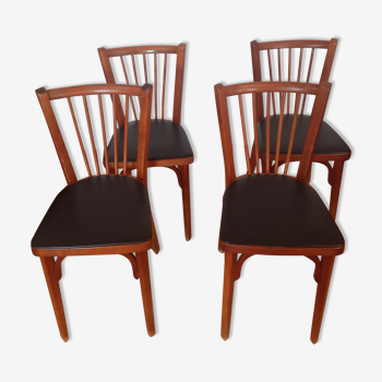 Suite 4 chaises Baumann (1950)