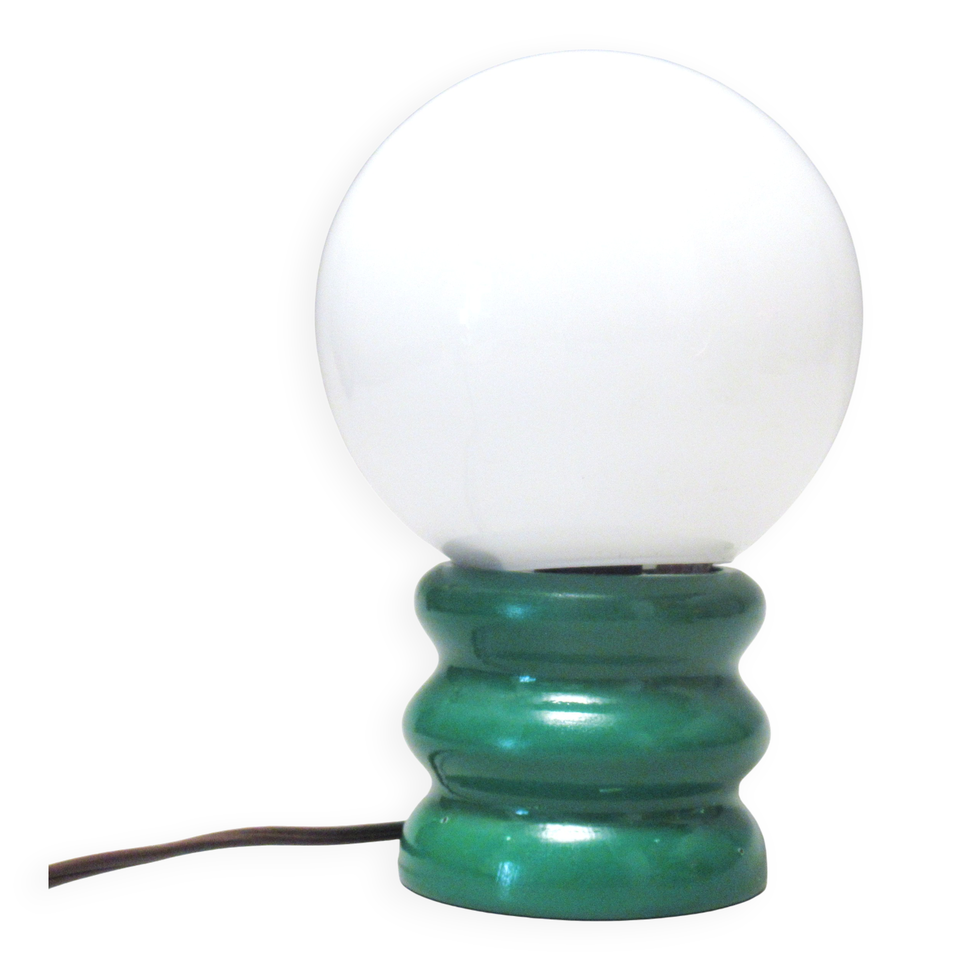 Green 1970s floor lamp with a globe shade.