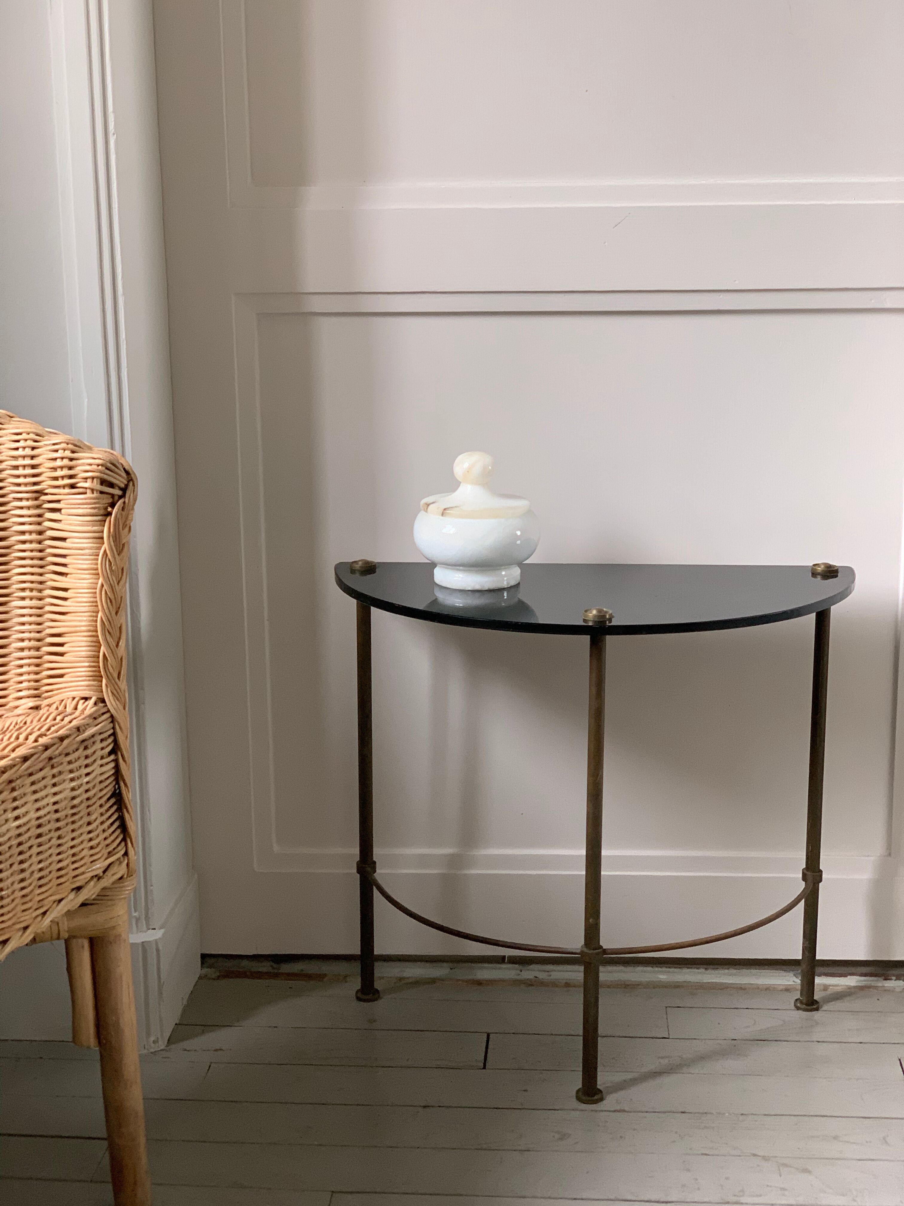 Half-moon console in glass and brass