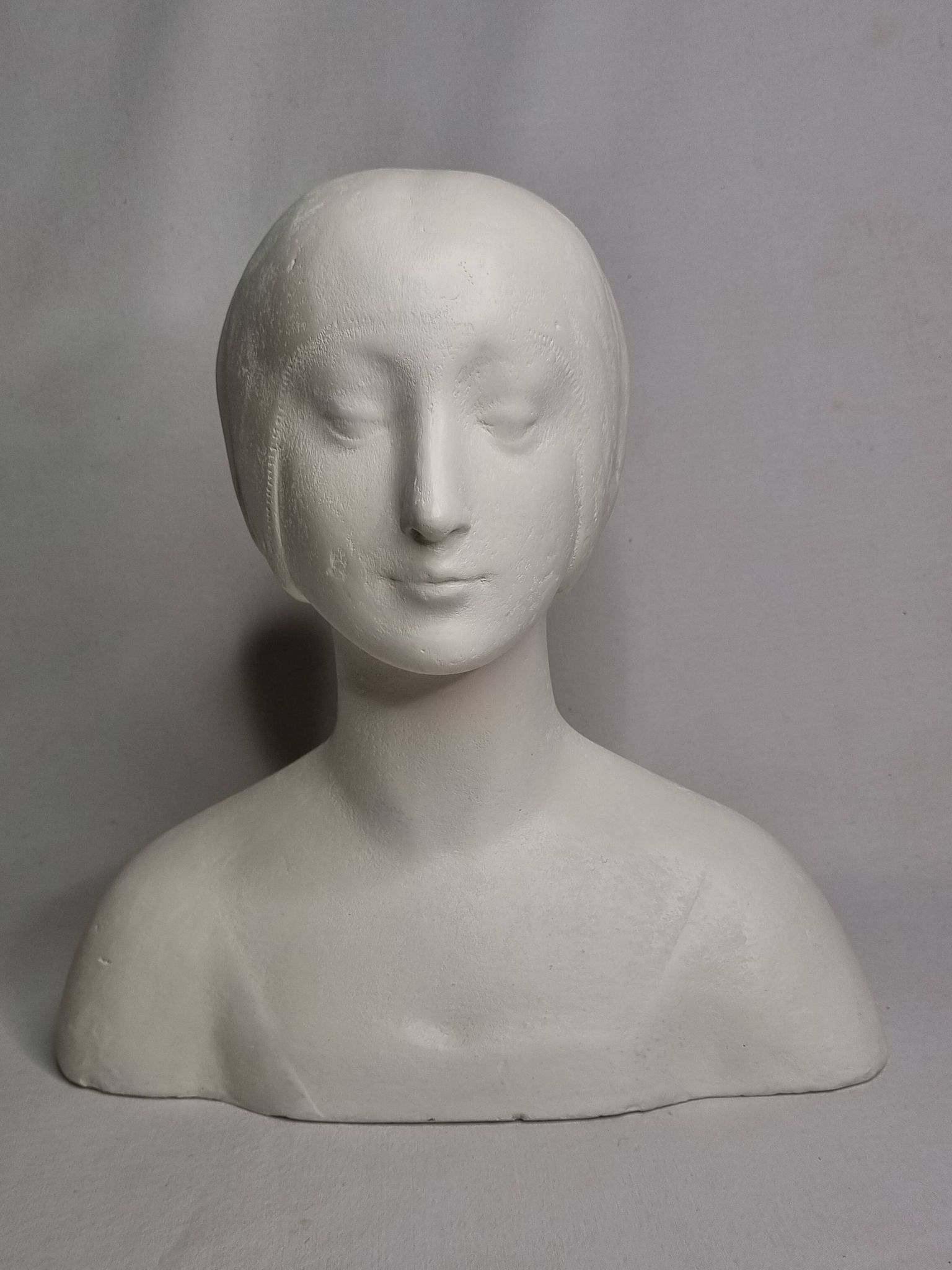 Bust after Laurana in Renaissance style, known as Aragon, patinated plaster, 33 cm.