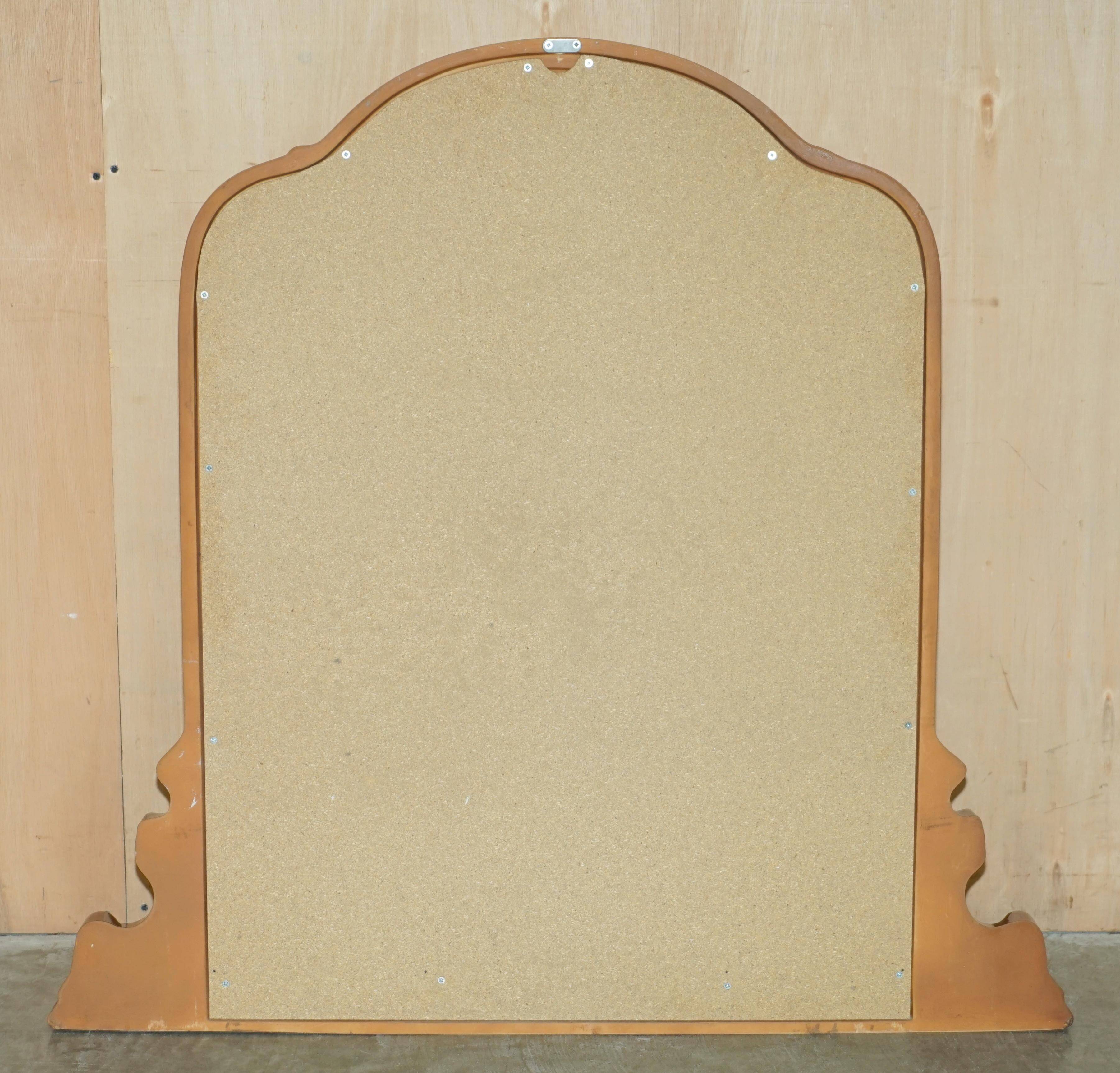 Vintage Art Deco decorative mirror with a thick frame.