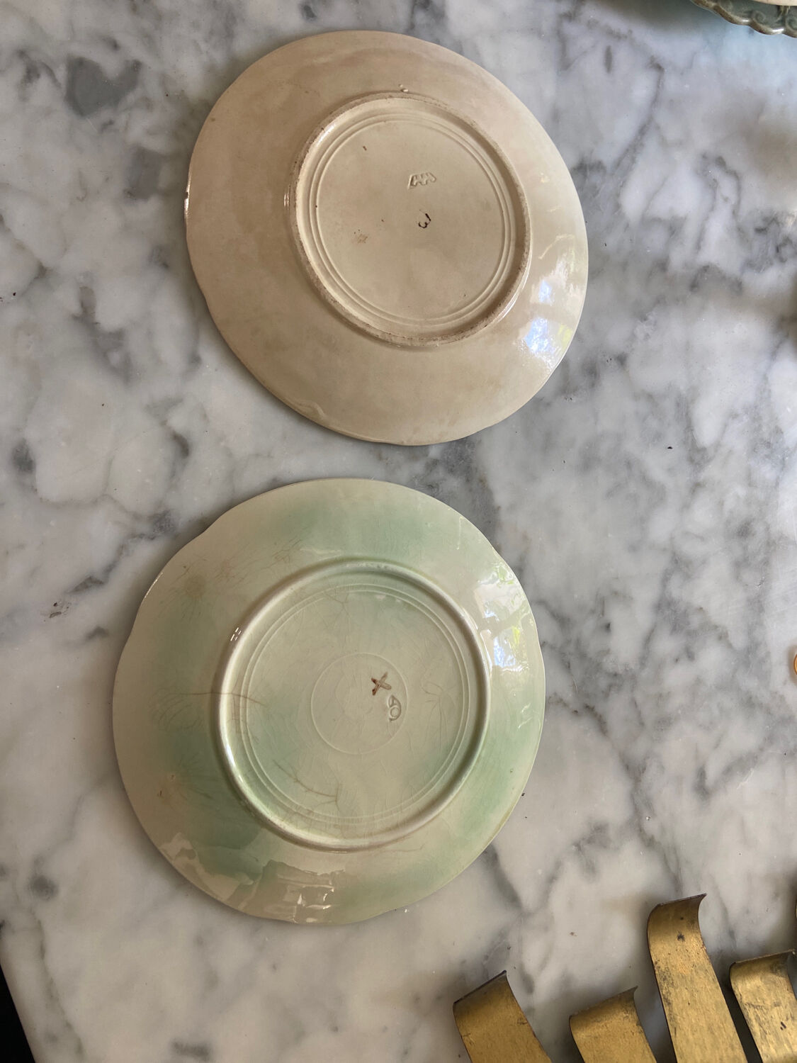 Duo of antique slip plates