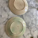 Duo of antique slip plates