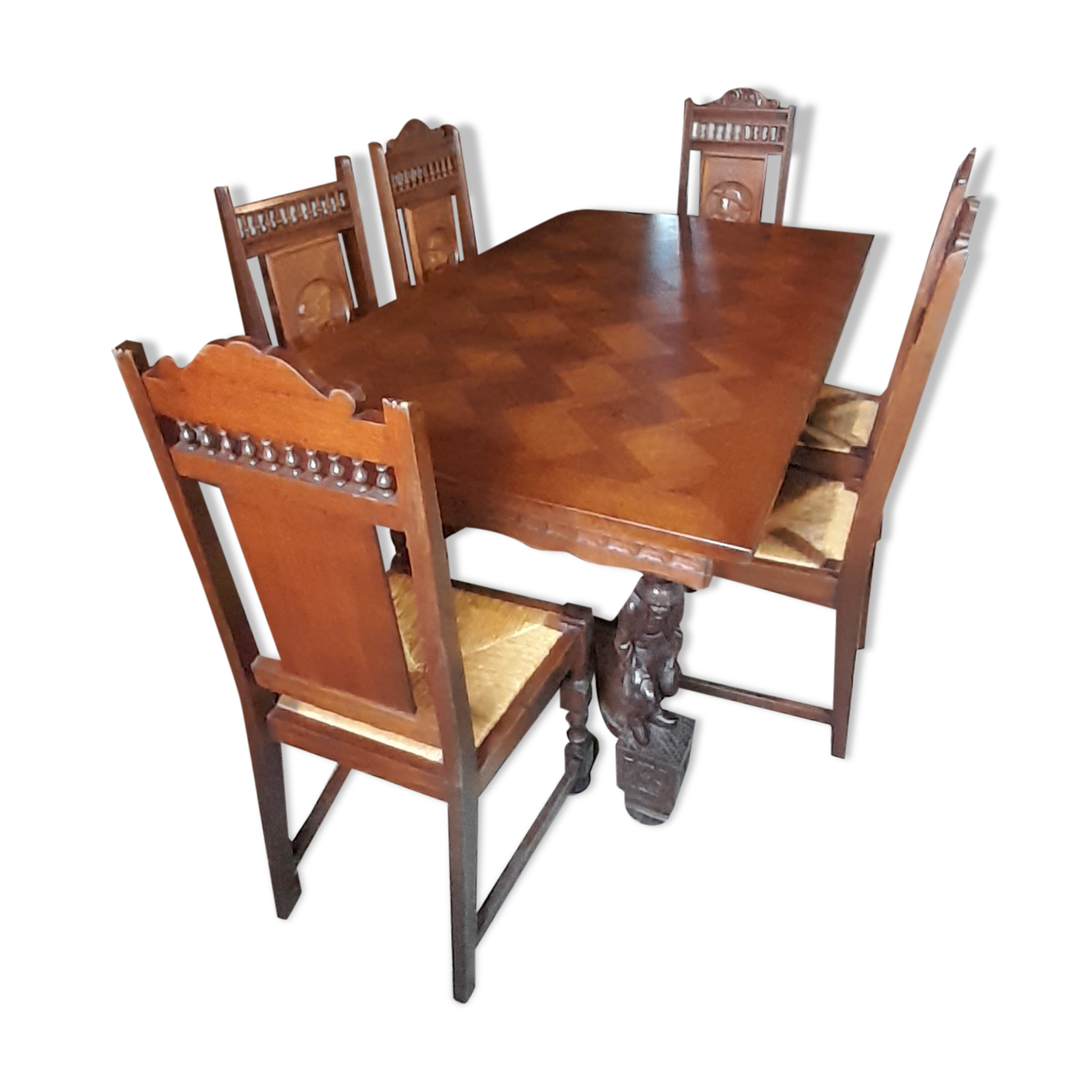 Breton dining room table with 2 extensions and 6 chairs with carved Breton characters