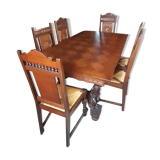 Breton dining room table with 2 extensions and 6 chairs with carved Breton characters