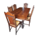 Breton dining room table with 2 extensions and 6 chairs with carved Breton characters