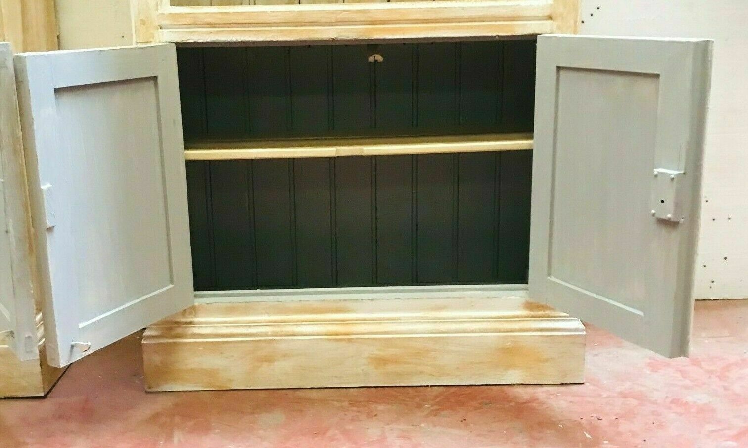 Pair of store windows in patinated fir