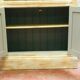 Pair of store windows in patinated fir