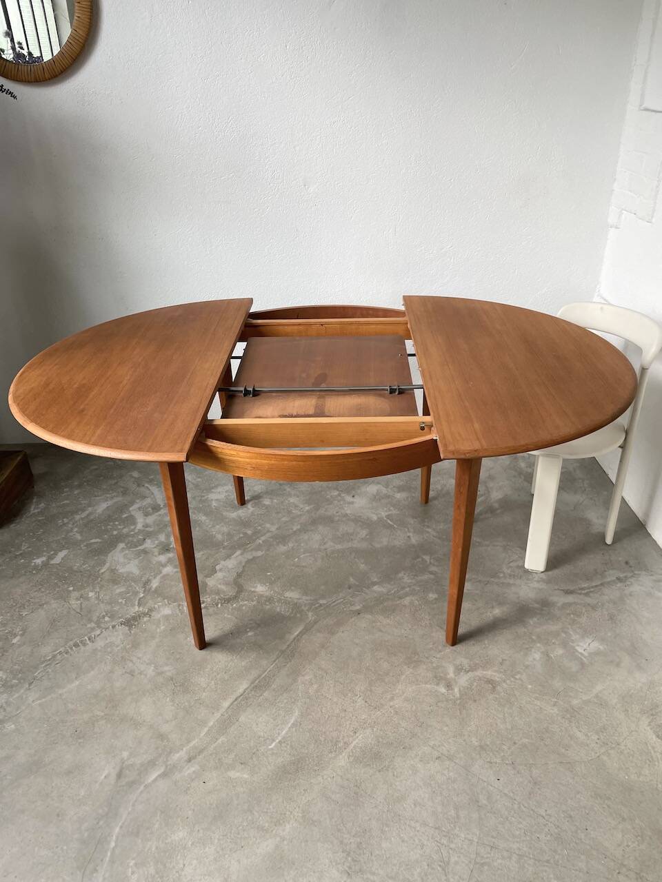 Scandinavian round teak table with extension