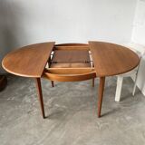 Scandinavian round teak table with extension
