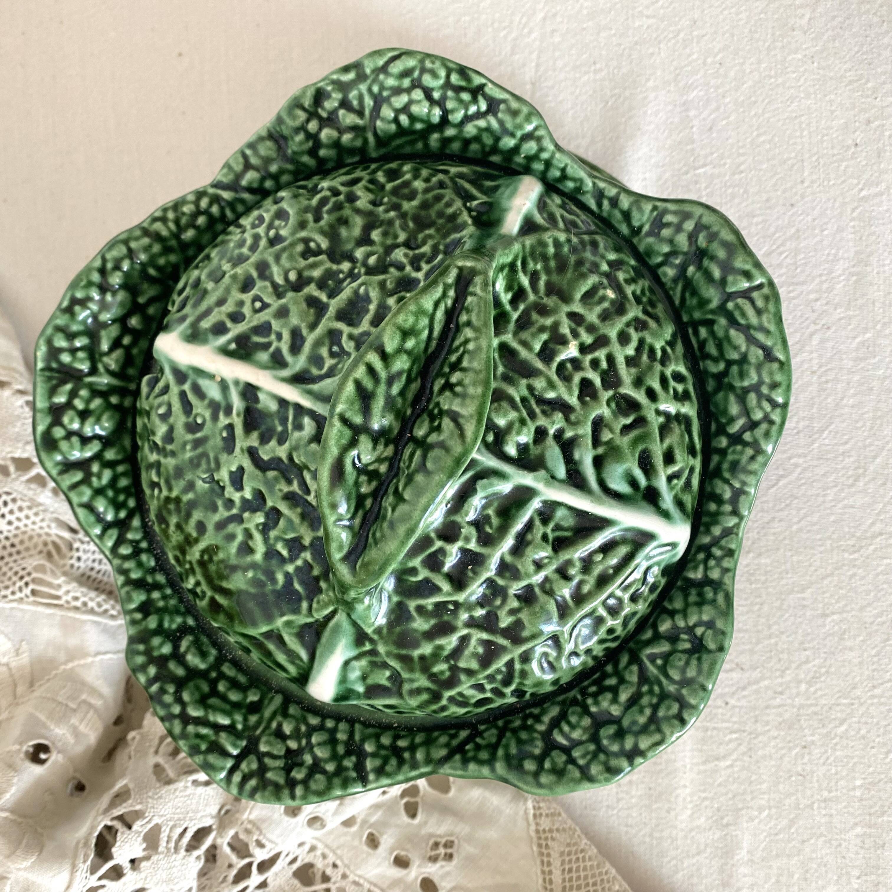 Soup tureen and green cabbage dish in barbotine