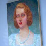 Art-Deco portrait, elegant woman with green eyes