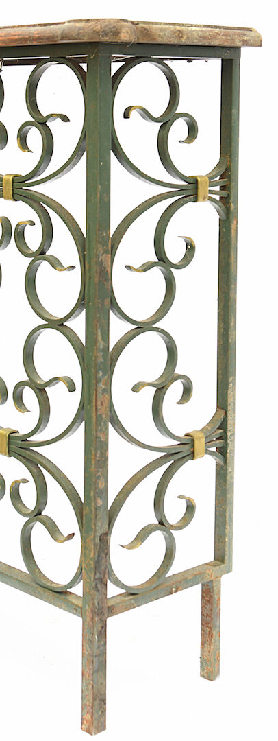 The wrought iron radiator cover