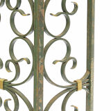 The wrought iron radiator cover