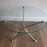 Round coffee table of neoclassical style in brass