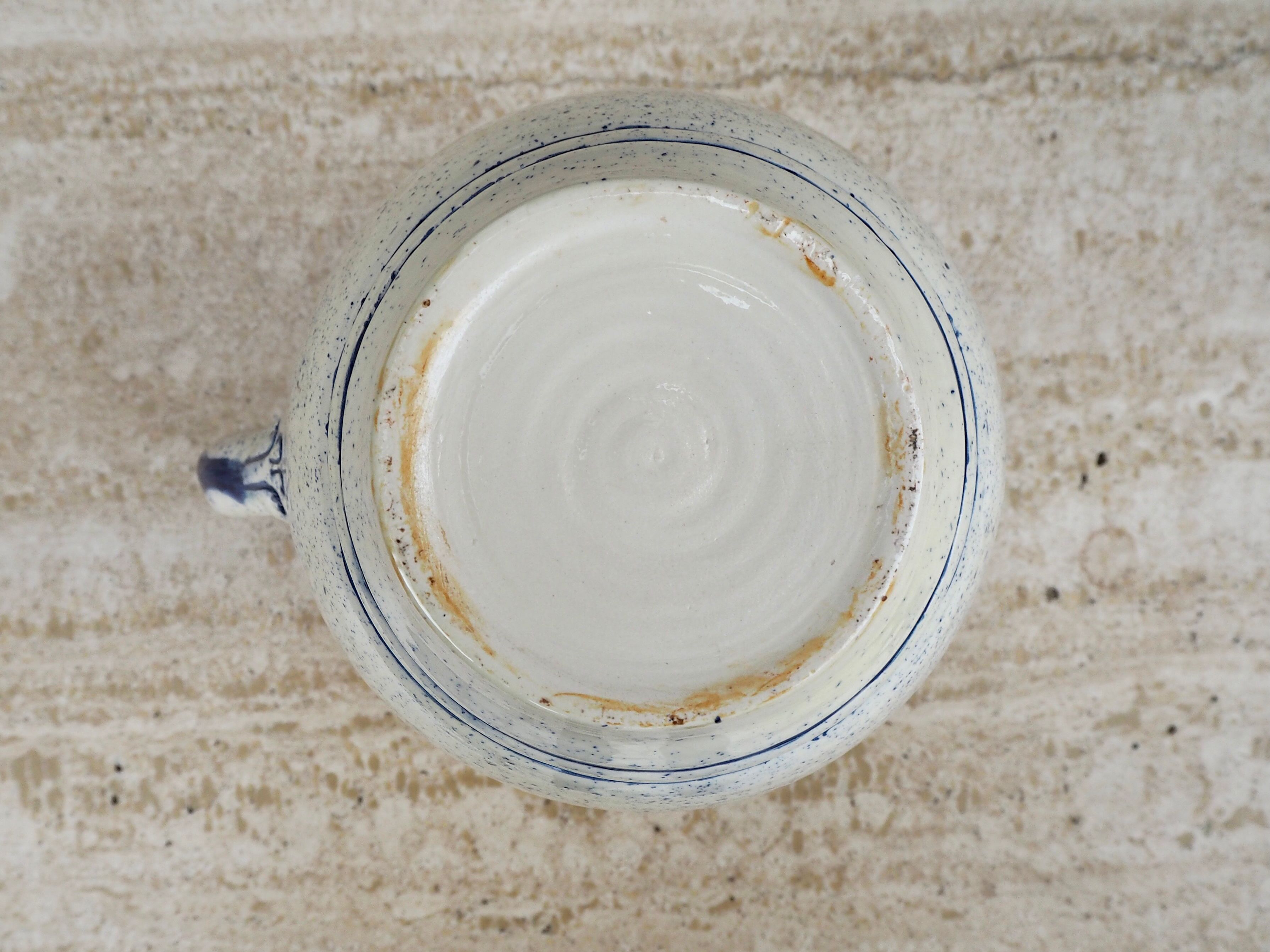 Speckled ceramic pitcher