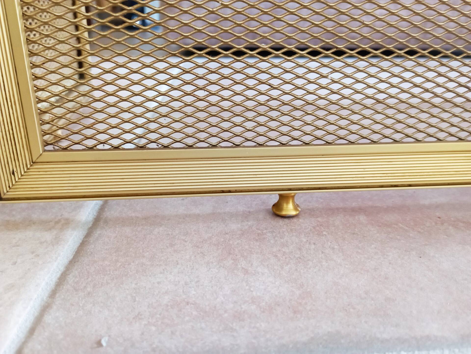 Gold metal fire screen