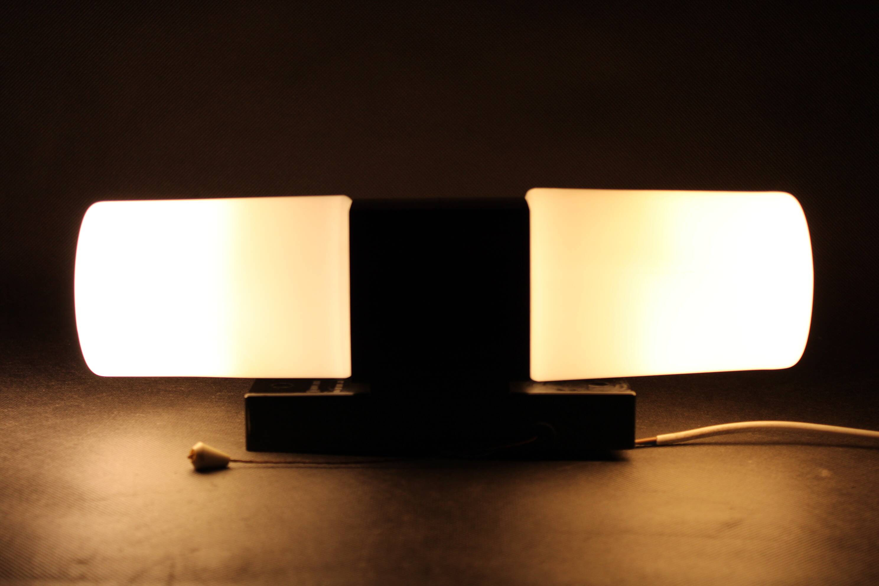 Mid-century wall light in bakelite and glass, 1960s