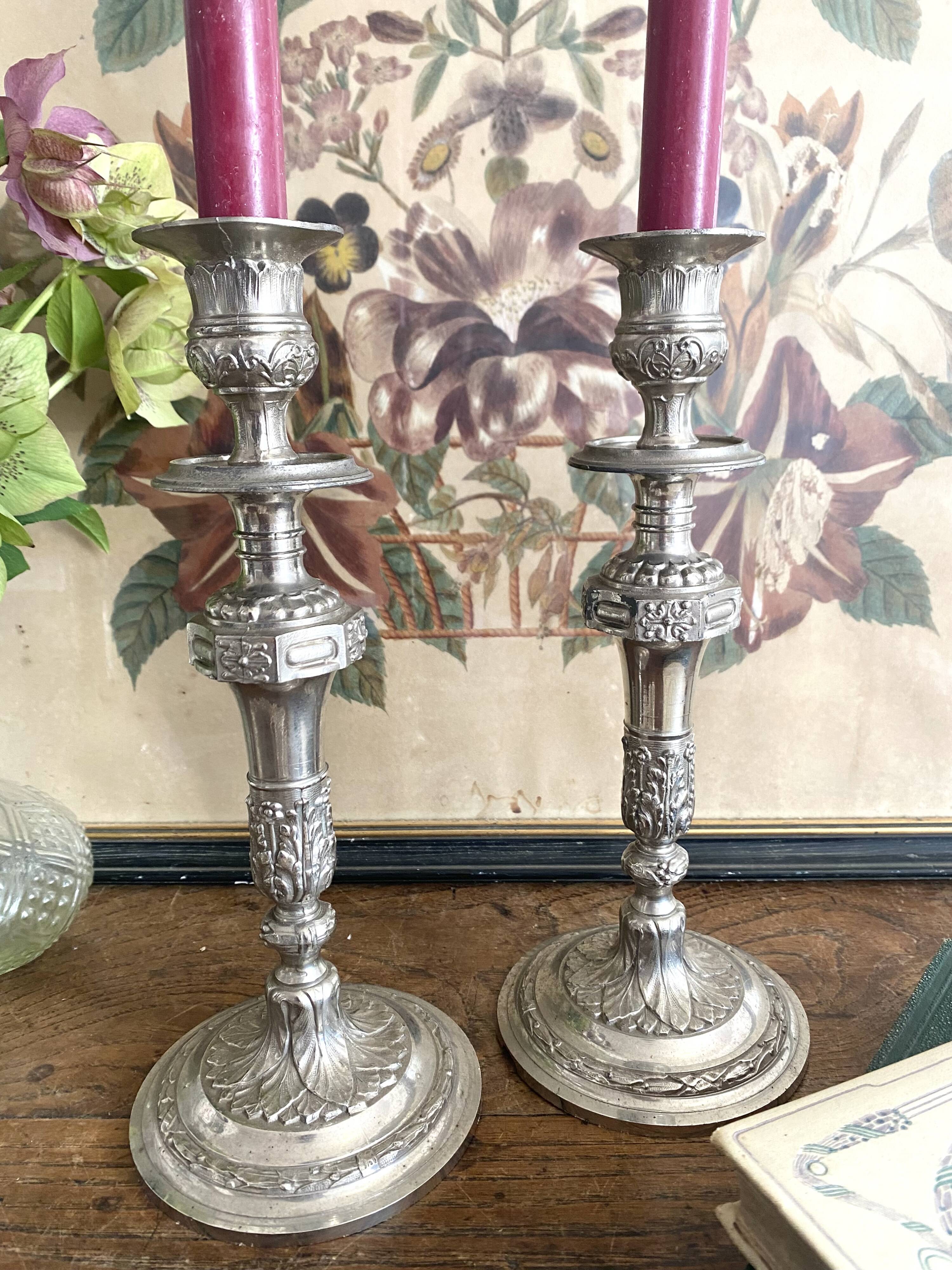 Antique silver-plated metal candlesticks