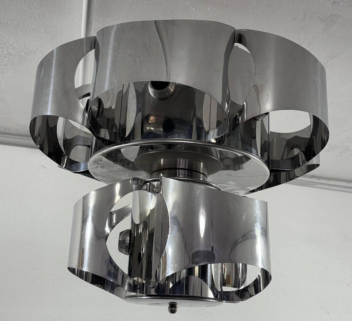 Curved steel chandelier attributed to Max Sauze, 9 lights