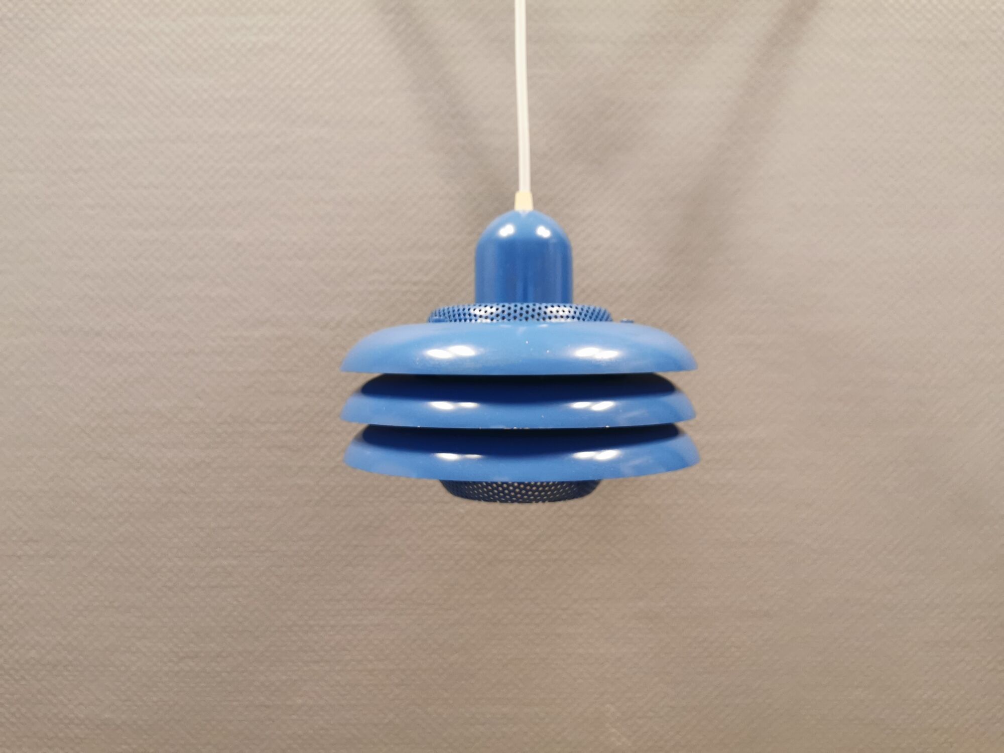 Blue lacquered metal lamp, with several layers of shades, Danish from the 80s.