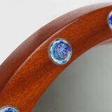 French round wooden mirror with elegant blue and white glass decoration, 19