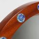French round wooden mirror with elegant blue and white glass decoration, 19