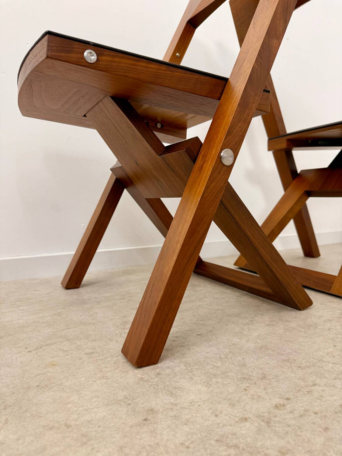 2 old folding chairs in wood and leather, postmodern design from the 80s vintage