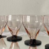 6 small Art Deco pink wine or water glasses with black stems.