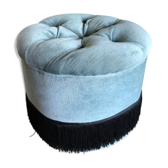 Pouf en velours et franges