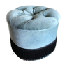 Pouf en velours et franges