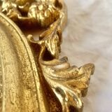 Old oval mirror in gilded resin - baroque style - 73 cm