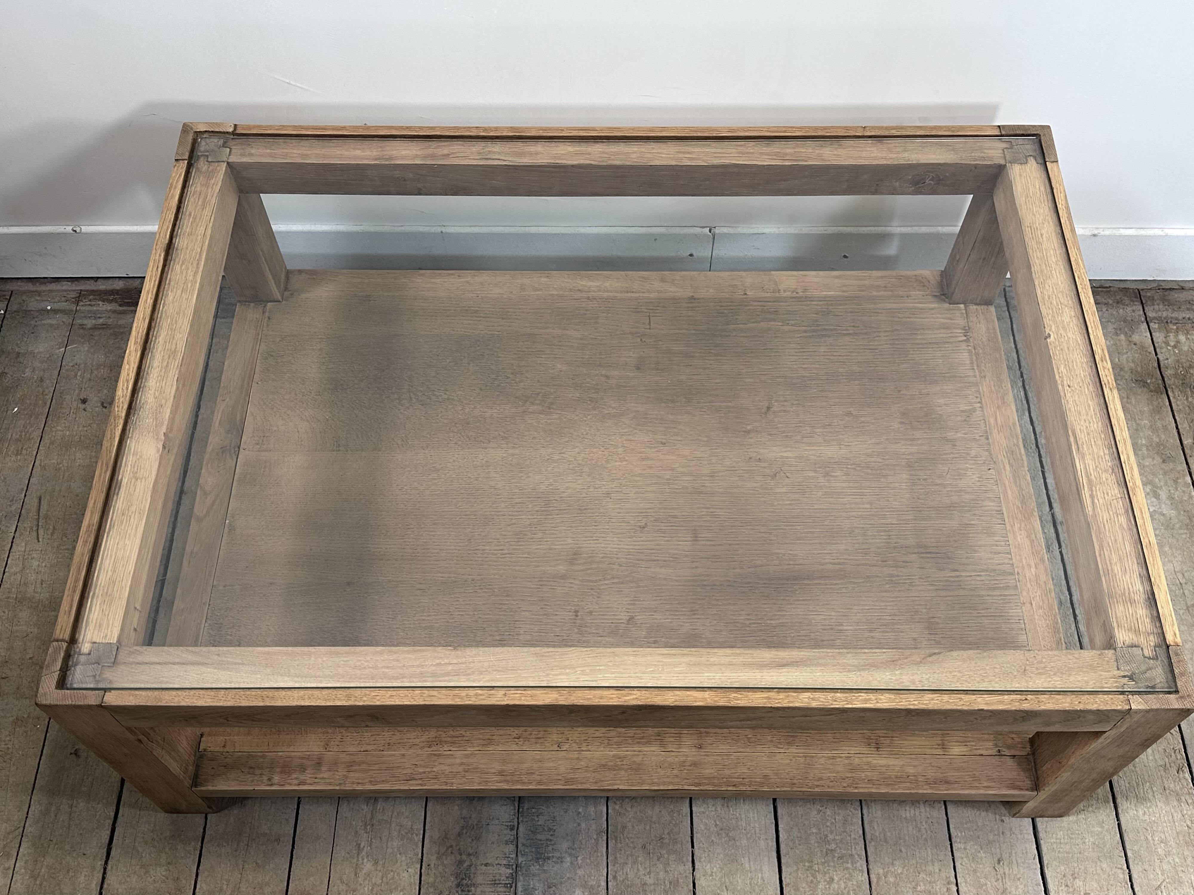 Brutalist oak coffee table with a glass top