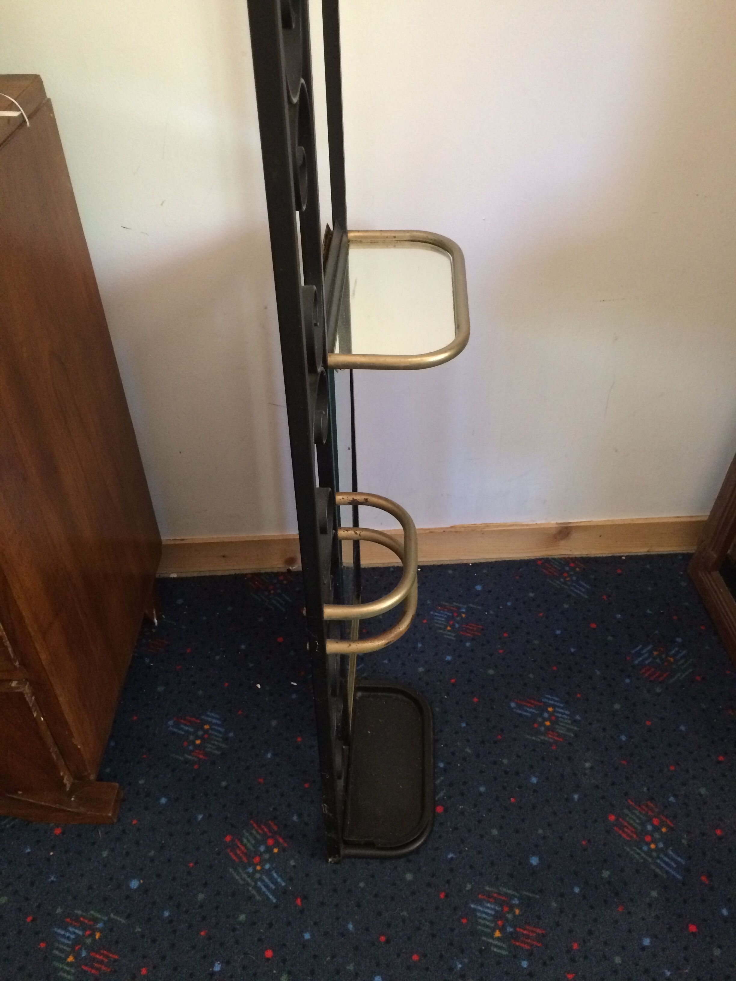 Coat hanger on wrought iron feet