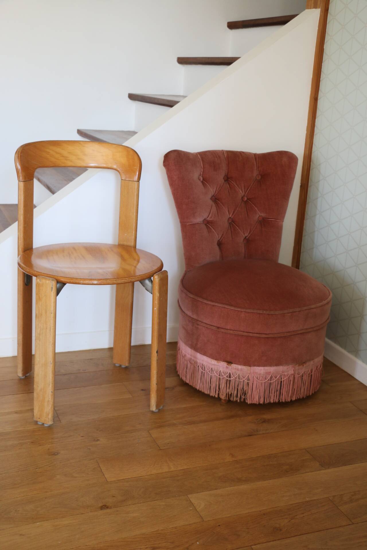 Powder pink fireside chair with fringes