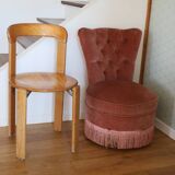Powder pink fireside chair with fringes