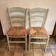 Pair of green straw sitting chairs