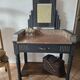 Art Deco dressing table with a movable mirror.