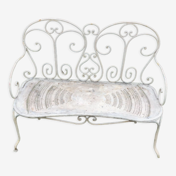 Banquette de jardin ancienne en fer forgé. Vers 1900